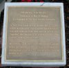 plaque by statue of Roy Disney